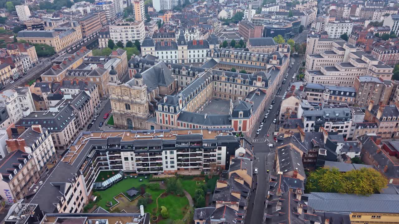 Historic city center of Rennes, France, Eglise Toussaints and Theatre National de Bretagne, cityscape. Aerial drone forward