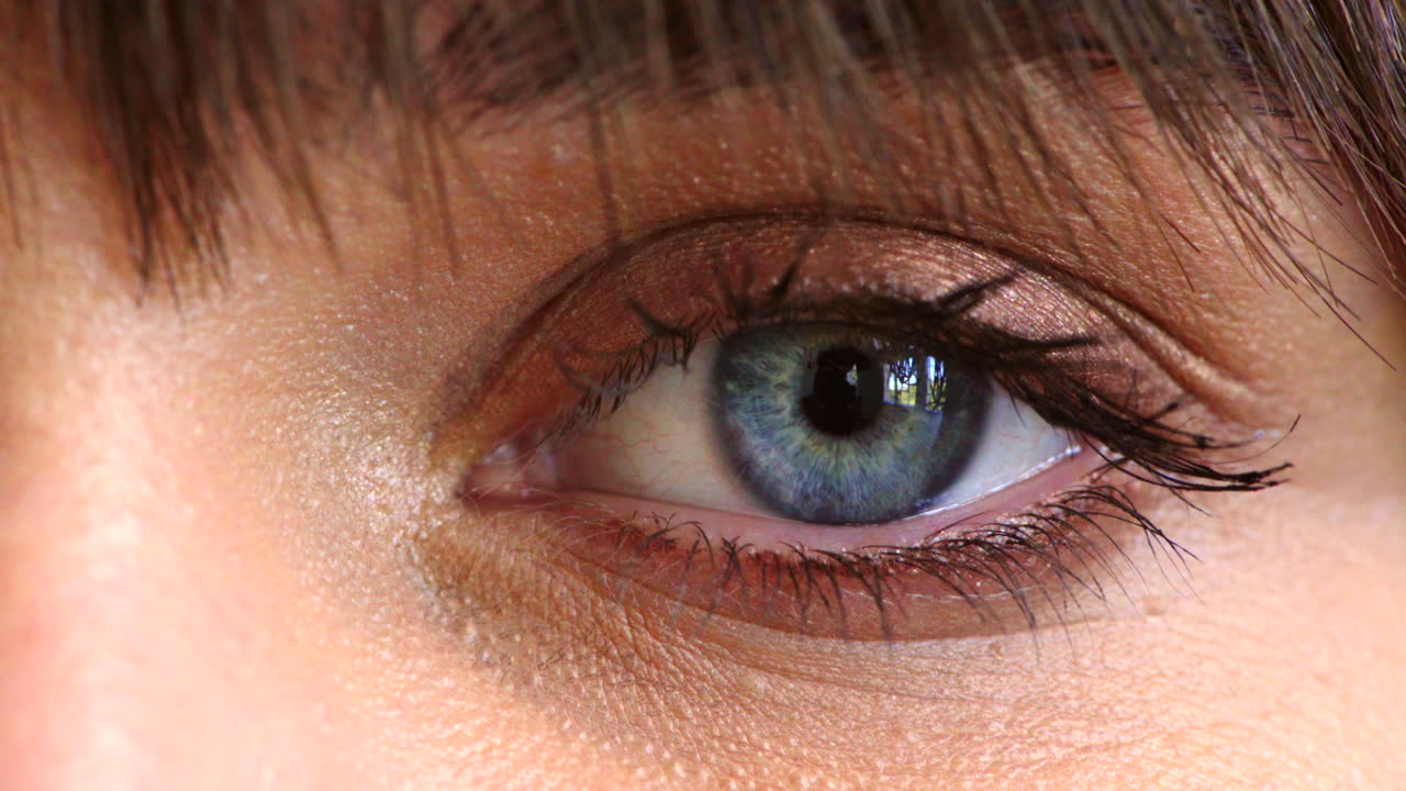 Closeup of woman's eye looking forward