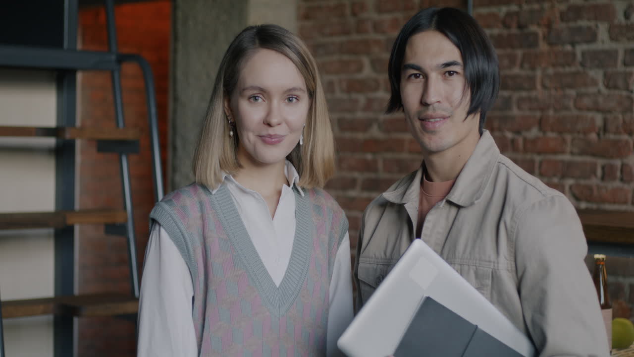 Two Colleagues Smiling at the Camera