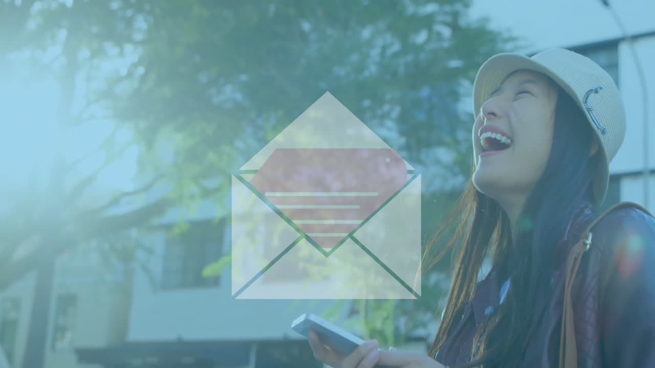 Holding smartphone, woman with email icon overlay smiling in outdoor animation scene