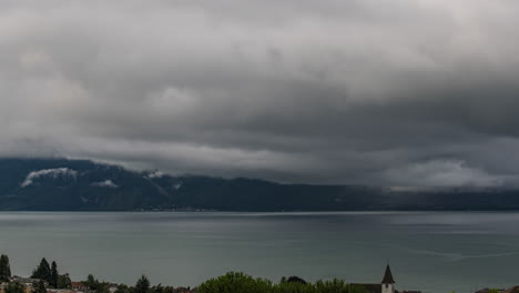 overcast over lake geneva near the town of lutry in switzerland