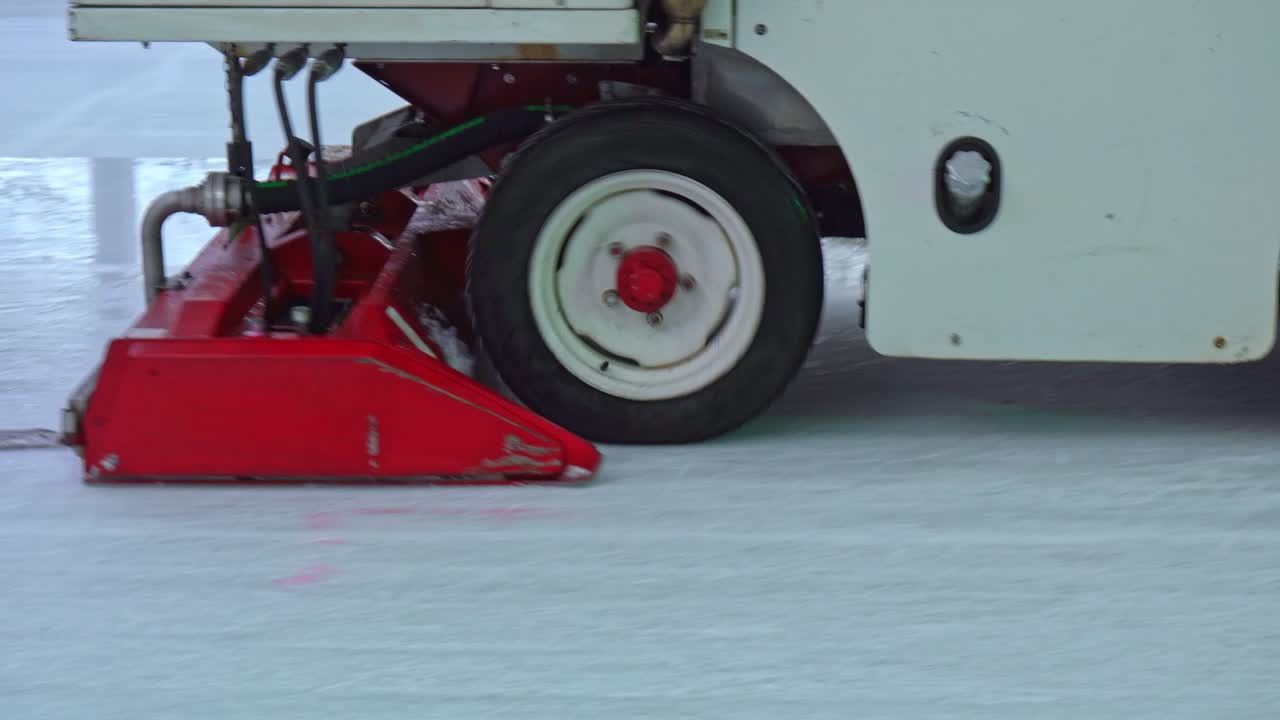 Ice Resurfacer Zamboni Cleaning and Smoothing Skating and Hockey Rink Surface