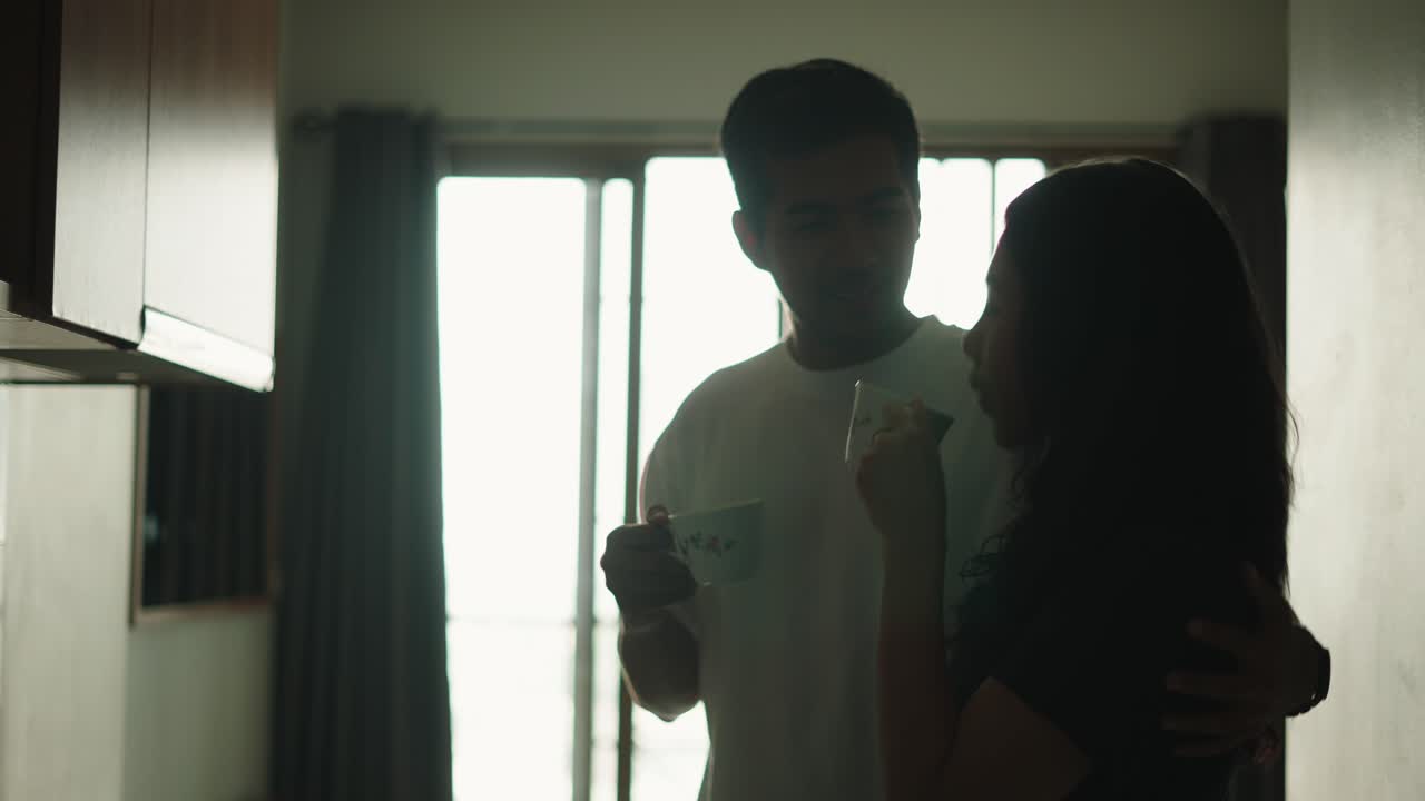 Romantic Couple Enjoying Coffee at Home