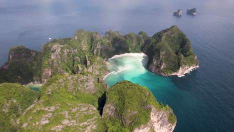 Aerial top-down drone view of Phi Phi Leh, Pileh Lagoon, Krabi province, Thailand. Amazing tropical island with turquoise water and white beach, famous travel destination, clear turquoise water.