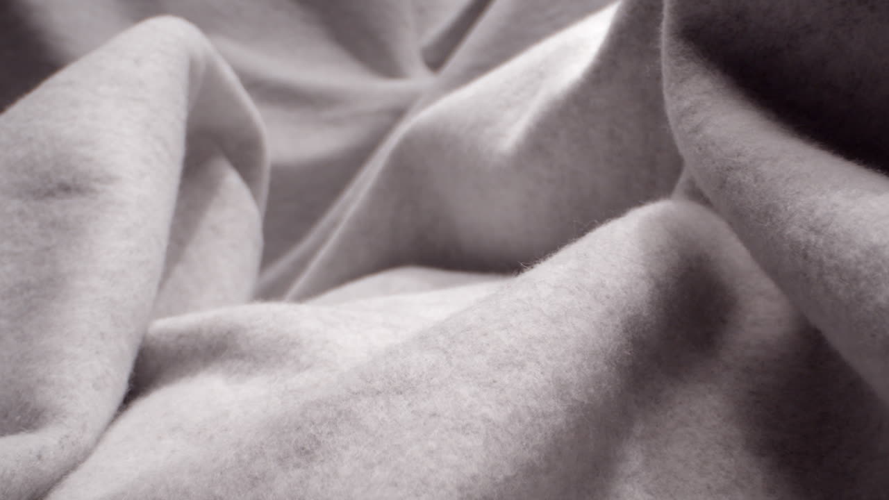 회색 직물의 매크로, 밀어넣기