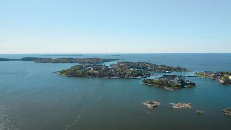 aerial view of the suomenlinna fortress island, sunny, spring day, in helsinki, uusimaa, finland - tracking, drone shot