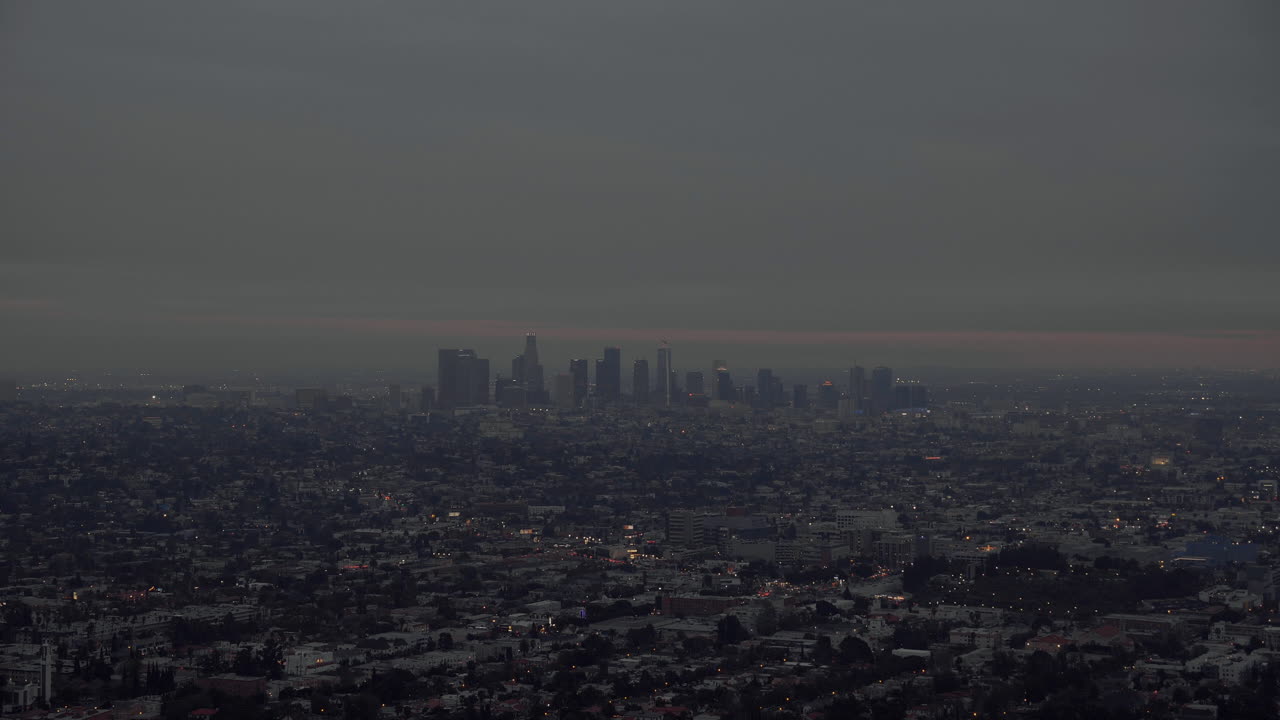 Los Angeles cityscape, skyline at dusk from Griffith Park Observatory California LA CA USA