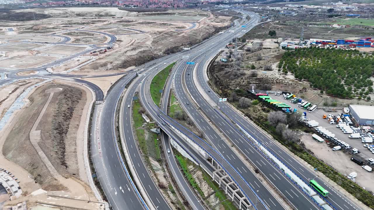 Highway in Madrid Spain splitting into lanes drone view