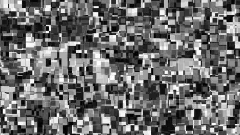 bloques cuadrados en movimiento, animación de la transformación de la superficie de fondo negro a blanco, bloques abstractos de fondo, miles de bloques moviéndose en un cuadrado, formas cuadradas que causan fatiga visual.