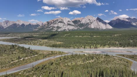 Drone-view-of-the-North-Saskatchewan-River-as-it-cuts-through-the-Kootenay-Plains-Ecological-Reserve-in-the-Rocky-Mountains-of-Alberta,-Canada