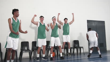 basketball team celebrating victory on court, showing excitement and teamwork