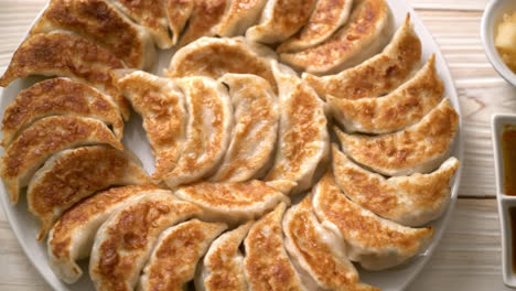 fried gyoza or dumplings snack with soy sauce in japanese style