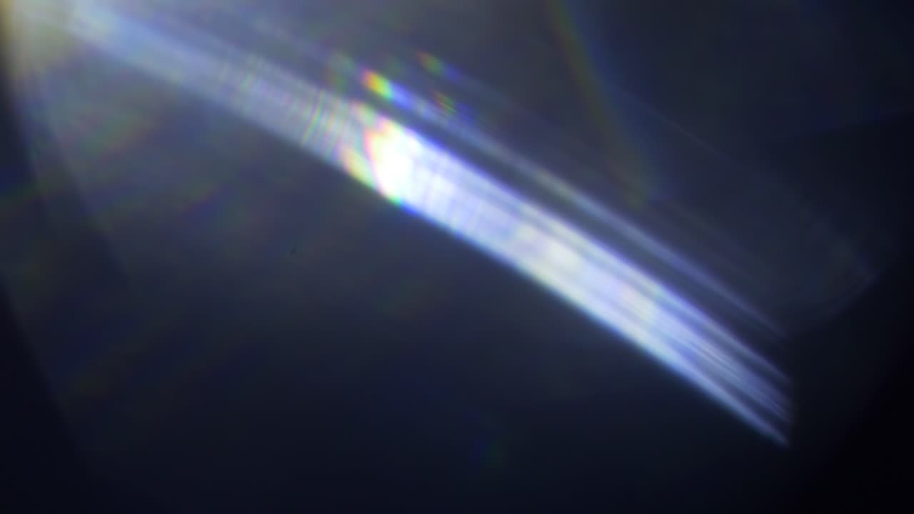 Fuoriuscite di Luce Dinamiche Blu e Viola con Bagliore dell'Obiettivo