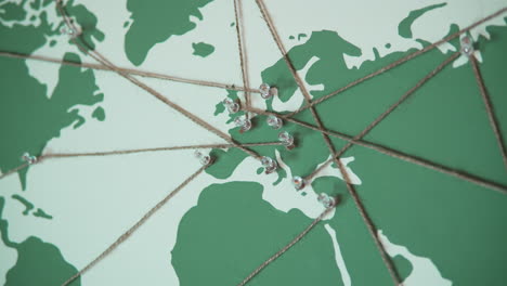 close-up of world map with destination pins