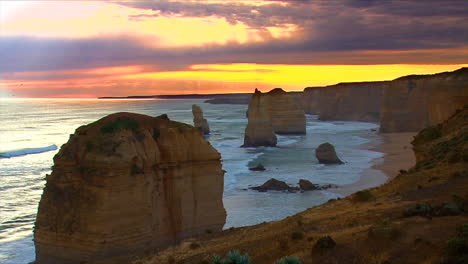 establishing shot of the 12 apostle rock formations along the great ocean road of victoria australia 1