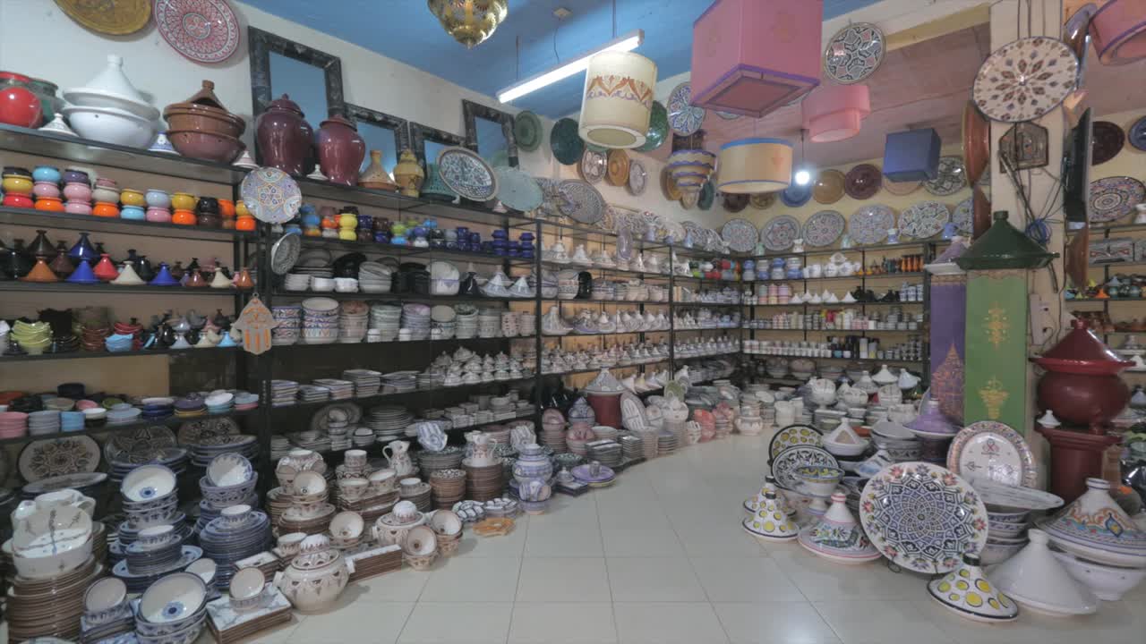 Beautiful and colorful handmade clay and ceramic pieces of art displayed at the pottery studio