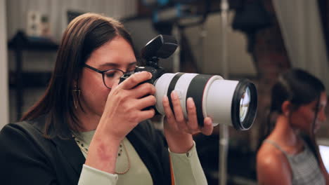a female photographer with a professional camera