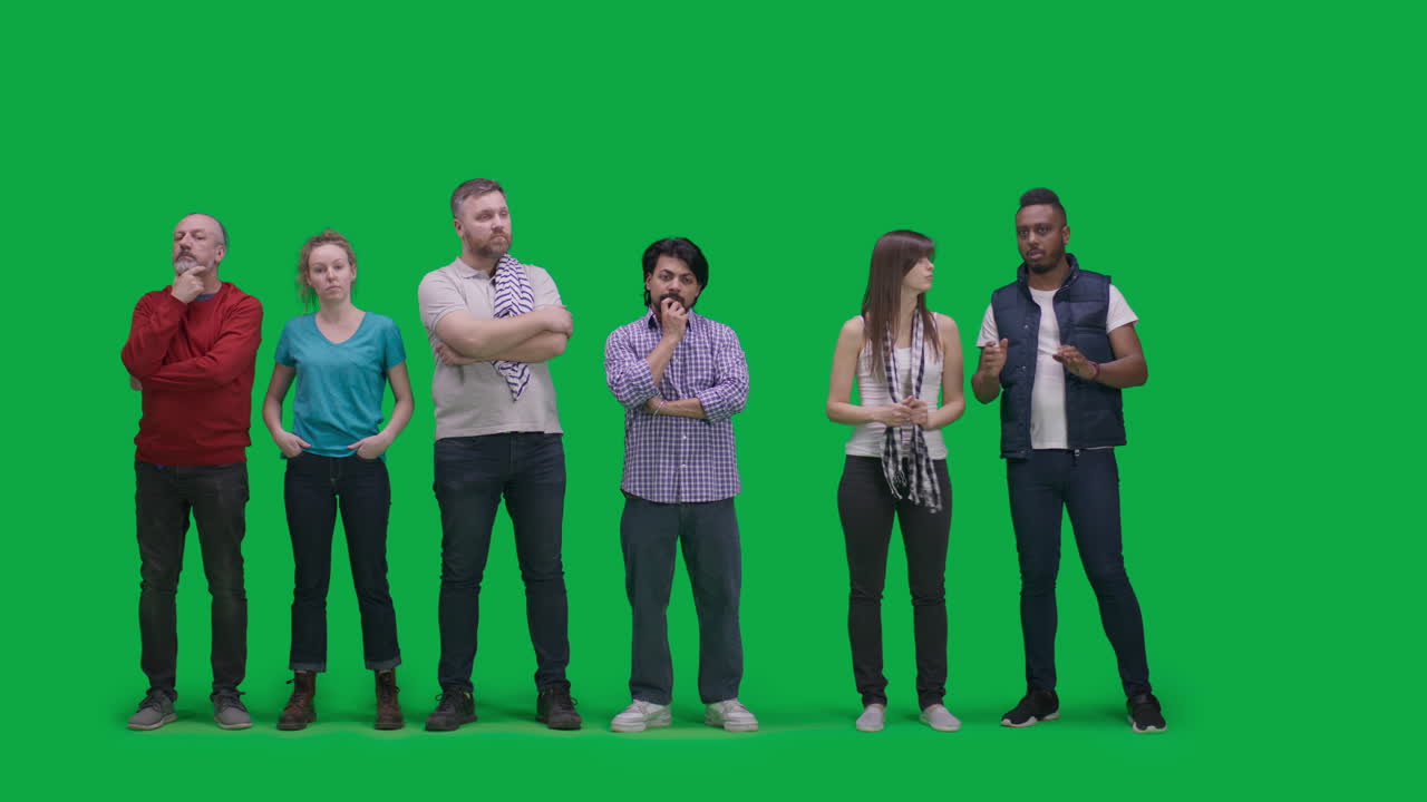 Diverse Group Posing in Front of Green Screen