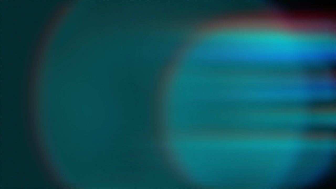 Dynamic Blue and Green Optical Lens Flare Light Leak