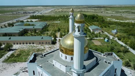 arystan bab mausoleum featuring the golden dome, kazakhstan - aerial orbit