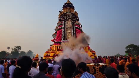 religious ceremony with statue burning