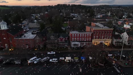 Aerial-truck-shot-of-small-town-USA-in-snowstorm