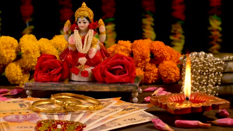 diwali celebration and puja in india with goddess lakshmi and diya