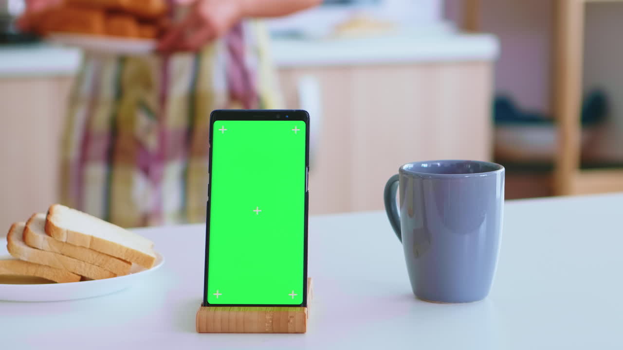 Green mockup on smartphone