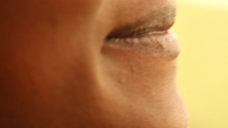 close up shot of the mouth and lips of a young adult brazilian woman