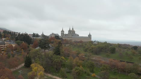 Aerial-footage-of-the-monastery-San-Lorenzo-de-El-Escorial-in-Spain-on-a-cloudy-day