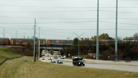 Train-passing-over-bridge-in-Dallas,-Texas