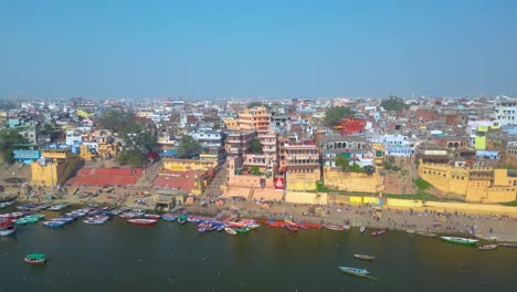 AERIAL-view-of-Dashashwamedh-Ghat,-Kashi-Vishwanath-Temple-and-Manikarnika-Ghat-Manikarnika-Mahashamshan-Ghat-Varanasi-India