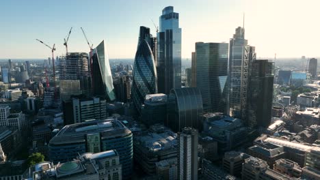 LONDON,-UK---10-JUNE-2022:-Establishing-Aerial-drone-View-of-Gherkin-skyscraper-with-London-Skyline,-20-Fenchurch-or-Walkie-Talkie,-sky-garden-by-the-Thames-River,-United-Kingdom,-Europe