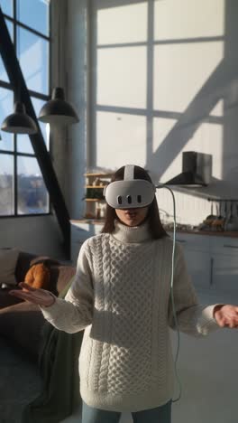 woman wearing vr headset in modern kitchen