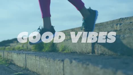 animation of words good vibes over woman exercising on promenade by the sea