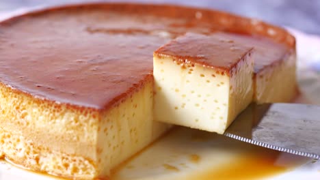 caramel custard pudding on a plate on table ,