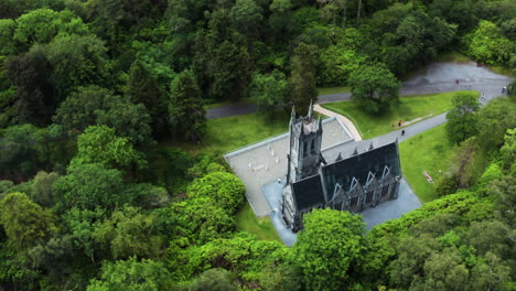 aerial view of kylemore abbey castle building in lush ireland landscape