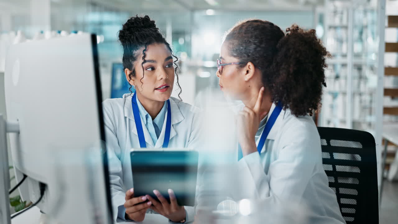 Scientists collaborating in a lab