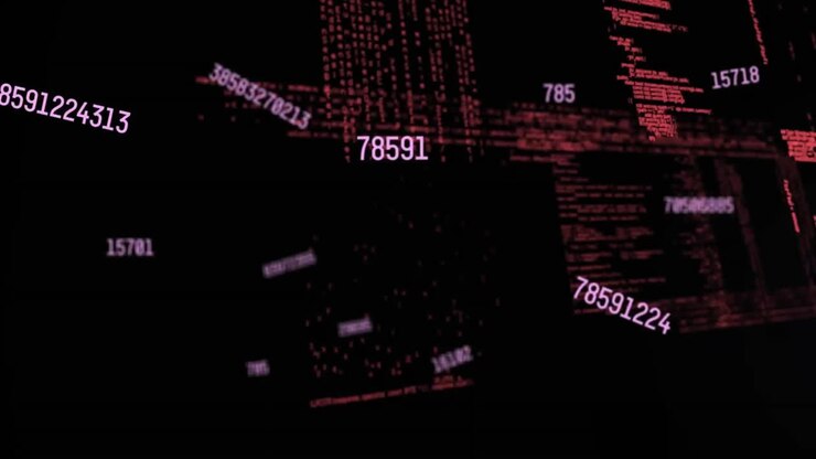 Animation of changing numbers, lens flares and computer language against black background