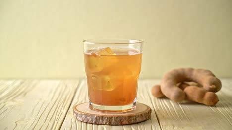 delicious sweet drink tamarind juice and ice cube - healthy drink style