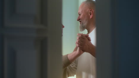 couple dancing at home