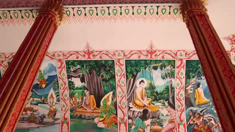 Colorful-religious-paintings-on-the-interior-of-Pha-That-Luang-Golden-Stupa-Buddhist-Temple-in-Vientiane,-Laos