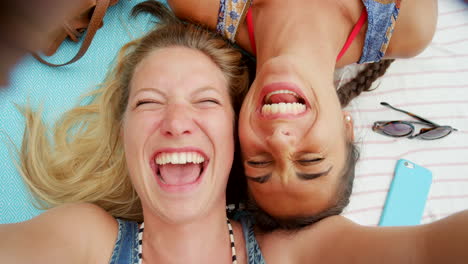 happy friends taking a selfie