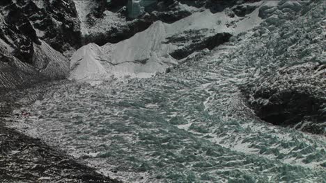 pan from basecamp through icefall to everest summit