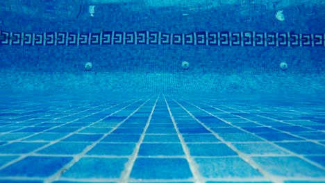 swimming pool underwater, blue water background