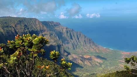 experience the iconic na pali coast of kauai, hawaii, with golden light illuminating its rugged cliffs, showcasing the breathtaking beauty of this tropical paradise.