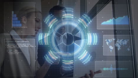 discussing data analytics, business professionals using futuristic animation in meeting