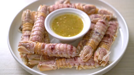 steamed crayfish or mantis shrimps or stomatopods with spicy seafood sauce