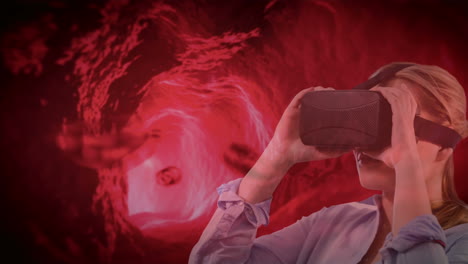 using vr headset, woman exploring virtual animation of human blood vessel