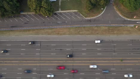 aerial top down view of southern state traffic as the cars go by in the day time